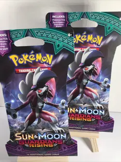 Lot of 2 Pokemon TCG Sun and Moon Guardians Rising Sleeved Booster Packs - Image 1