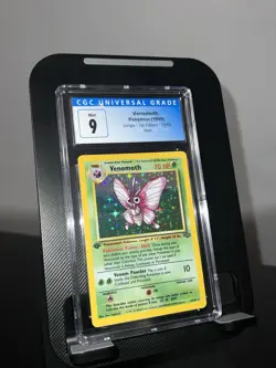 1999 Pokemon Jungle 1st Edition Venomoth Holo Rare 13/64 CGC Mint 9 - Image 1