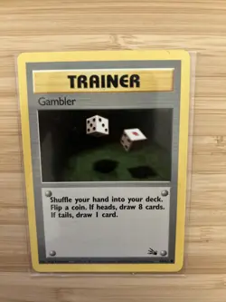 Trainer Gambler 60/62 1st First Edition Common 1999 WoTC Pokemon Card NM/M - Image 1