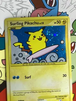 2009 Pokemon Rising Rivals Surfing Pikachu 114/111 Secret Rare Holo SWIRL NM - Image 4