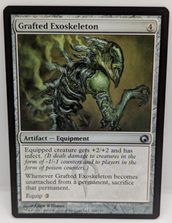 Grafted Exoskeleton Scars of Mirrodin Regular NM MTG - Image 1