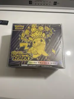 Pokemon TCG Surging Sparks Etb Factory Sealed (With Etb Protector) - Image 1