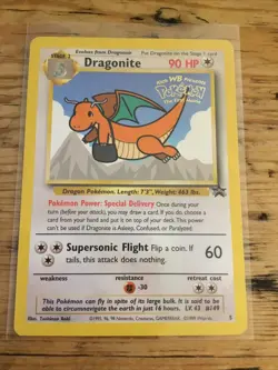 1999 Pokemon CCG The First Movie Dragonite WB Black Star Promo Card #5 Excellent - Image 1