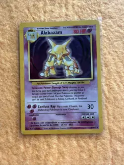 Pokemon Card Base Set Holo Alakazam 1/102 Near Mint - Image 1