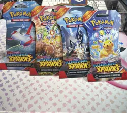 Pokemon TCG Surging Sparks Booster Blister Pack [4 Unique Arts] Sealed - Image 1