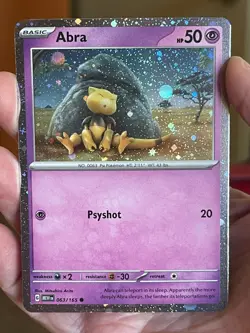 POKEMON ABRA 063/165 COSMOS HOLO SCARLET & VIOLET 151 NM CARD - Image 1