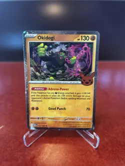 Okidogi (Cosmos Holo) 111/167 Trick or Trade 2024 Holo Pokemon Card - Image 1