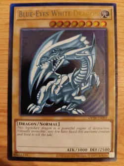 Blue-Eyes White Dragon - OP28-EN001 - Near Mint NM - Ultimate Rare - Unlimited - Image 1