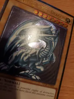 Blue-Eyes White Dragon - OP28-EN001 - Near Mint NM - Ultimate Rare - Unlimited - Image 2