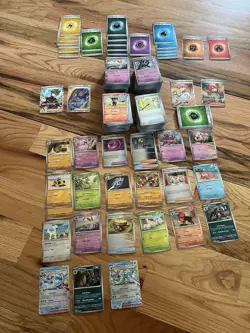 Pokemon: Prismatic Evolutions BULK LOT of 550 CARDS PLUS POKEBALL, HOLO ENERGIES - Image 1