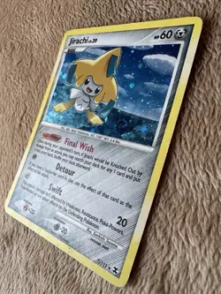 2009 Pokemon TCG Rising Rivals Jirachi Cosmos Holo Rare 7/111 LP/MP Lv.39 HP60 - Image 2
