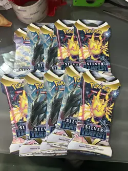 Lot of 10 Pokemon TCG Silver Tempest Factory Sealed Sleeved Booster Packs - Image 1