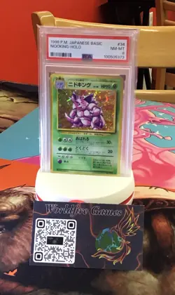 1996 POKEMON BASE SET JAPANESE #34 NIDOKING-HOLO PSA 8 - Image 1