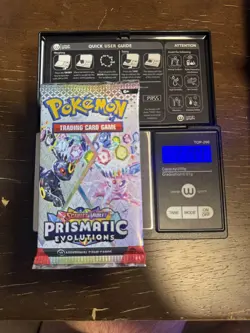 21.94g HEAVY - Pokemon TCG Prismatic Evolution Booster Pack!Possible GOD - Image 1