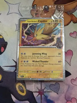 Team Rocket’s Zapdos 078/182 EB Games Stamped Promo Destined Rivals Pokemon Card - Image 1