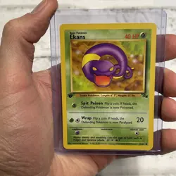 Ekans 46/62 Fossil 1st Edition Non Holo WotC 1999 Vintage Pokemon TCG Card NM - Image 1