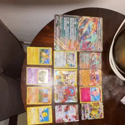 Pokemon cards just trying to sell comes with some sleeves - Image 1