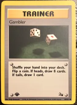 TRAINER GAMBLER 60/62 1ST EDITION FOSSIL POKEMON CARD -NM/Mint - Image 1