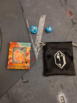 MTG Final Fantasy Chocobo Racing Pin, Bag and Crystal Dice - Image 1