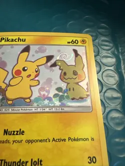 Pikachu SM162 Sun and Moon Black Star Promo Card Holo Swirl Top Of Mimikyu - Image 2