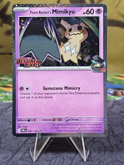 Team Rocket's Mimikyu SVP 087 Pokemon Destined Rivals Prerelease Stamped Promo - Image 1