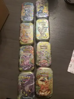 8 Pokemon TCG: Scarlet & Violet Prismatic Evolutions Mini Tins - Factory Sealed - Image 1