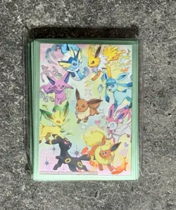 Pokemon Prismatic Evolutions UPC Accessories: Deck Box and Sleeves + Eevee Pouch - Image 3