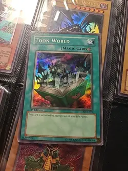 Yu-Gi-Oh! TCG - Toon World MRL-076 - 1st Edition Super Rare - Holo Wavy Print - Image 1