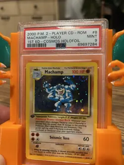 1999 Pokemon TCG 1st Edition Cosmos Holo Rare Card Machamp 8/102 PSA 9 - Image 1