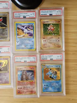 Lot of 34 PSA Graded Pokemon Cards 1997-2001 - Image 1
