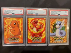 Lot of 3 PSA 9 Topps Pokemon Cards - Image 1
