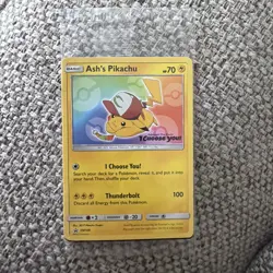 Ash’s Pikachu SM108 Non Holo Ultra Rare Promo Pokemon Card MINT Sealed Original - Image 1
