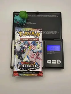 Pokemon TCG Prismatic Evolutions HEAVY pack Sealed Booster Pack (23.07g) - Image 1
