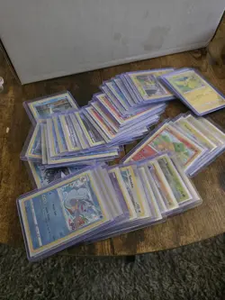 42 Card Lot Pokemon Holo With Top Loaders And Sleeves - Image 1