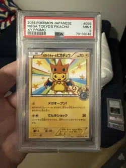 Pokemon (JPN) MEGA TOKYO'S PIKACHU XY PROMO #098 CHARIZARD PONCHO PSA 9 - Image 1