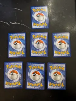 7 x Holo/EX Pokemon Card Bundle (Surging Sparks Set, NM) - Image 2
