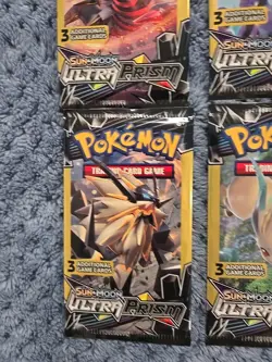 Pokemon Sun & Moon Ultra Prism TCG 3 Card Pack (4 Packs) - Image 4