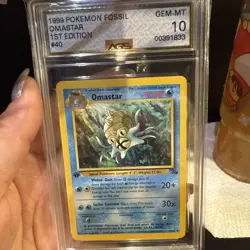Vintage 1999 Pokemon Fossil Omastar 40 1st Edition Graded AGS 10 Gem - Image 1