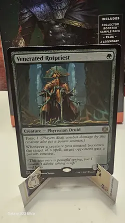 Venerated Rotpriest Phyrexia: All Will Be One Regular - Image 1