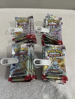 74x EMPTY Pokemon Prismatic Evolutions Booster Packs Wrappers AS-IS - Image 1