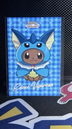 Eevee Vaporeon Poncho Cracked Ice Pokemon Let's Go Eevee Card Database NM - Image 1