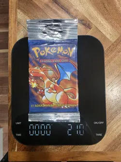 BASE SET (Charizard Art) SEALED HANGER/LONG CRIMP Booster Pack WOTC Pokemon Card - Image 1