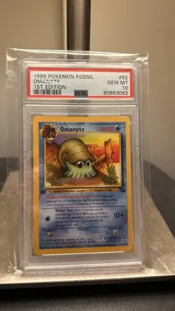 1999 Pokemon Fossil Omanyte 52/62 1st Edition PSA 10 #52 - Image 1