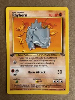 Rhyhorn 61/64 Jungle 1st Edition Non-Holo Common Pokemon Card NM - Image 1