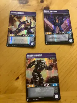 Transformers TCG 3 Cards Siege I & II Kickback, Ion Storm Runabout - Image 1