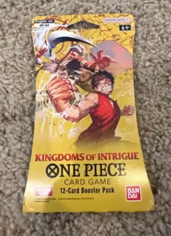 One Piece KINGDOMS OF INTRIGUE English Sleeved Booster OP-04 Sealed 12-Card Pack - Image 1