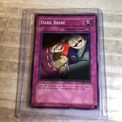 Dark Bribe Yugioh GX04-EN002 foil card - Image 1