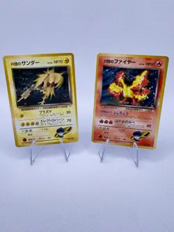 Vintage Japanese Pokemon Zapdos & Moltres Card Lot of 2 Nm Condition with Swirls - Image 1