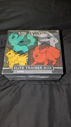 Discounted Pokemon Evolving Skies ETB Sealed (holes in seal - see pics) - Image 1