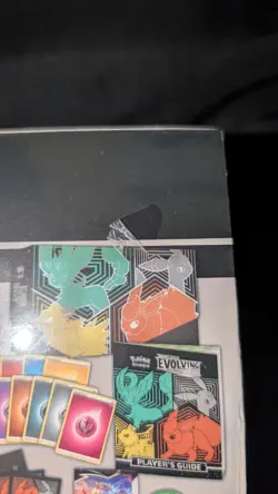 Discounted Pokemon Evolving Skies ETB Sealed (holes in seal - see pics) - Image 4